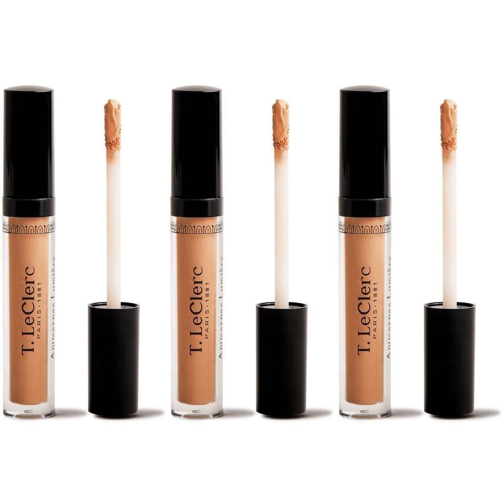 Drie T.Leclerc concealer applicators met beige inhoud en zwarte doppen.
