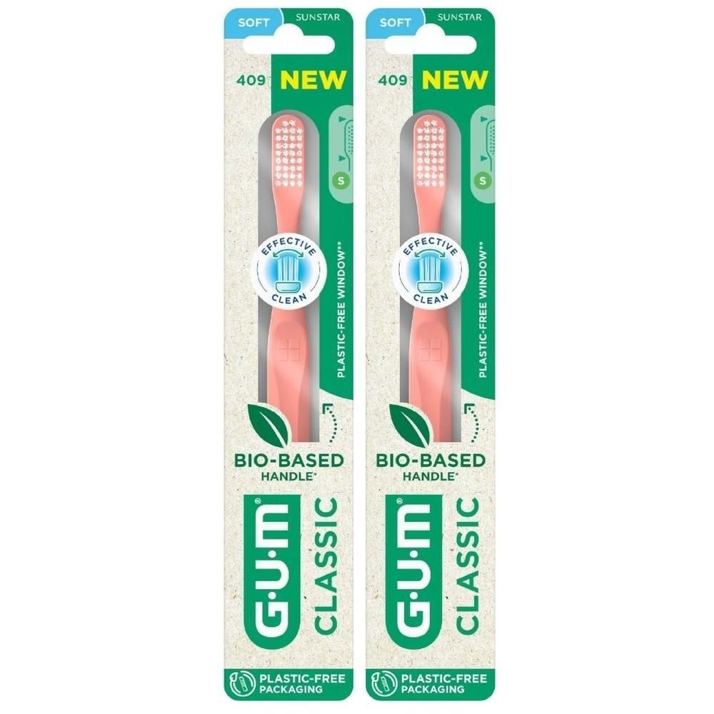 Deux brosses à dents GUM Classic Compact Soft roses, manche bio-sourcé, emballage sans plastique.