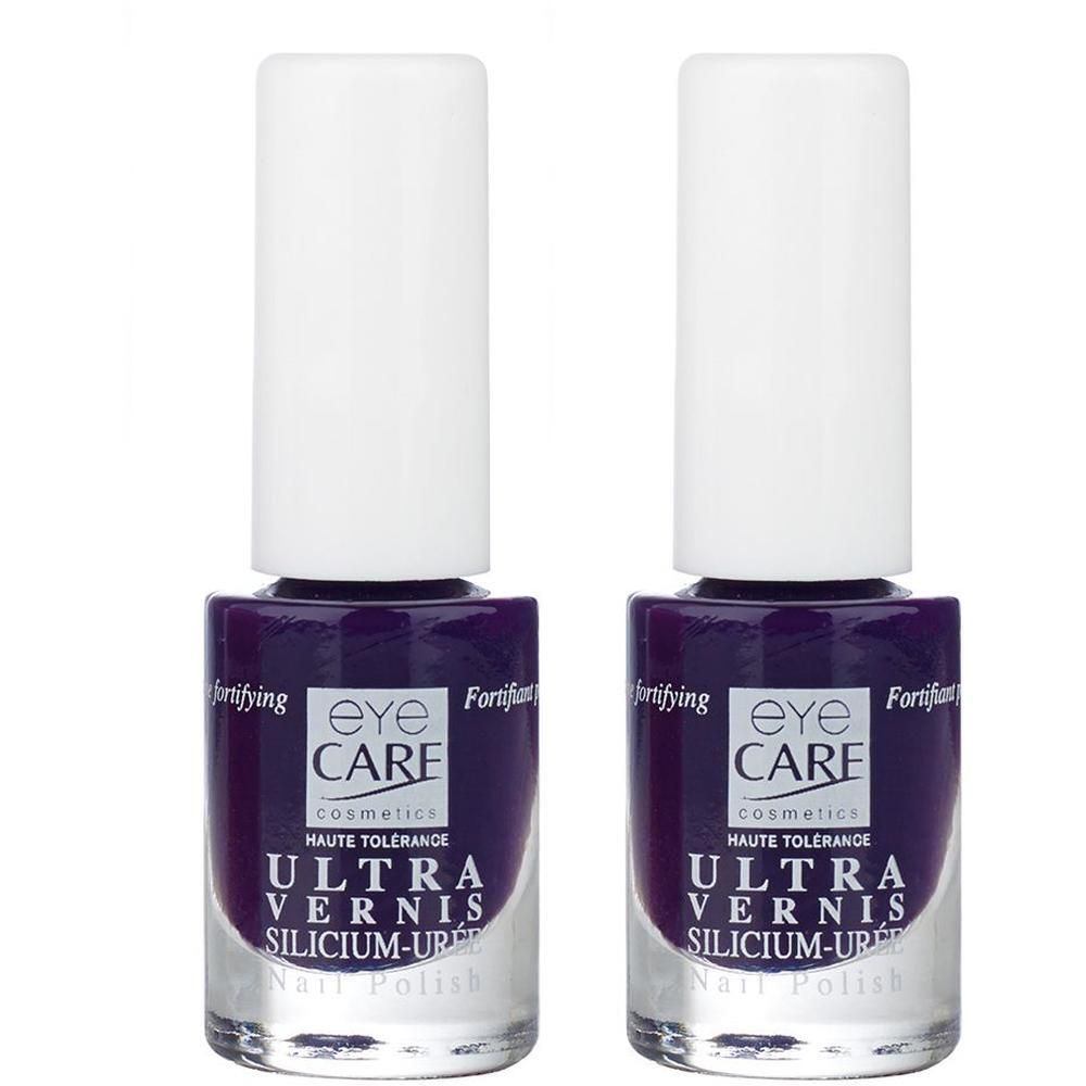 Deux flacons de vernis à ongles violet foncé Eye Care. "ULTRA VERNIS SILICIUM-UPRÉ" est indiqué sur l'étiquette.