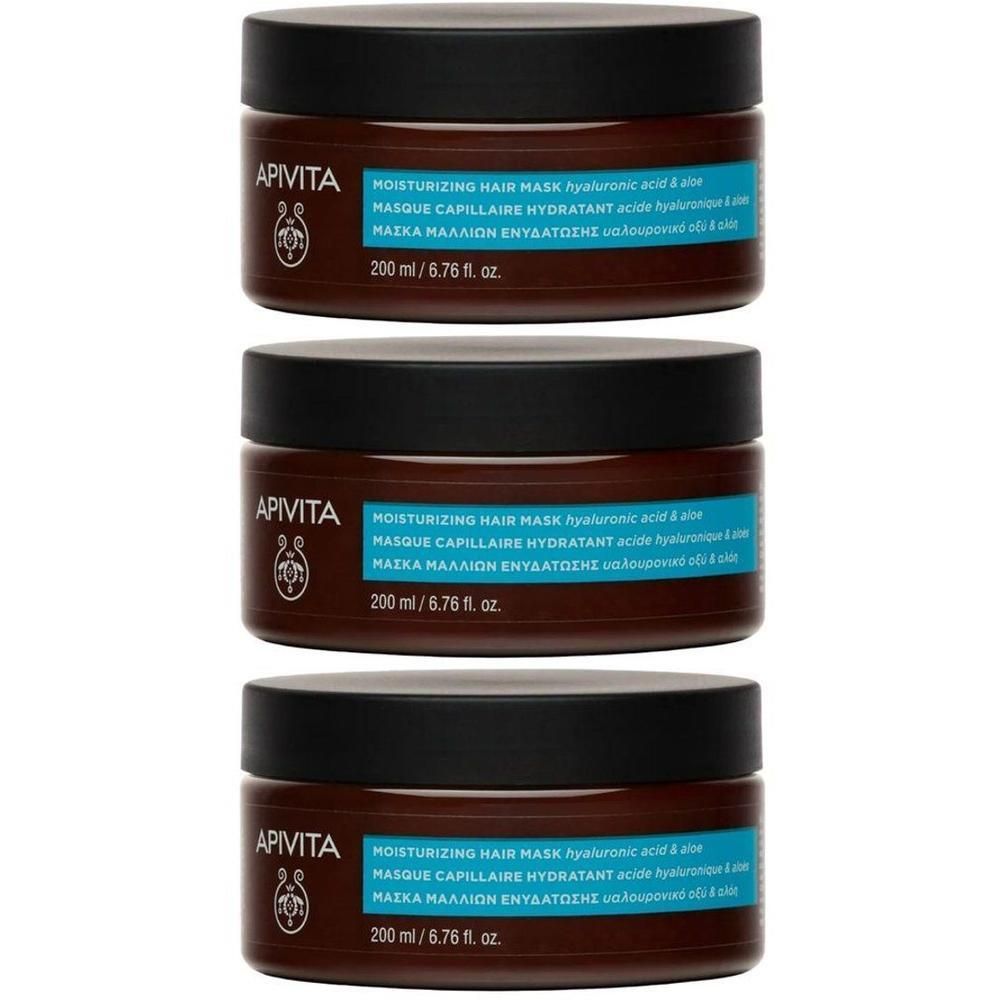 Trois masques capillaires Apivita Hyaluronic Hydra dans des pots bruns avec couvercles noirs. Étiquette avec détails bleus et blancs.