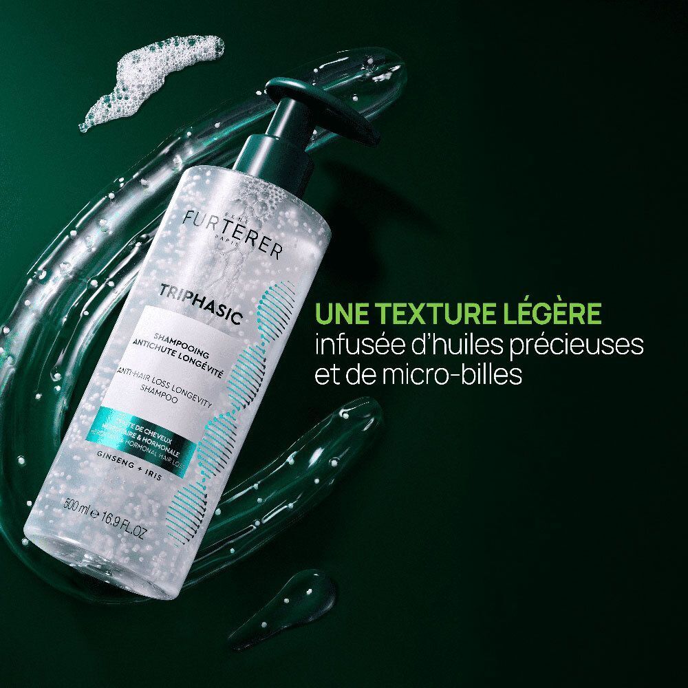 René Furterer Triphasic Shampooing à la texture légère infusée d'huiles et micro-billes.