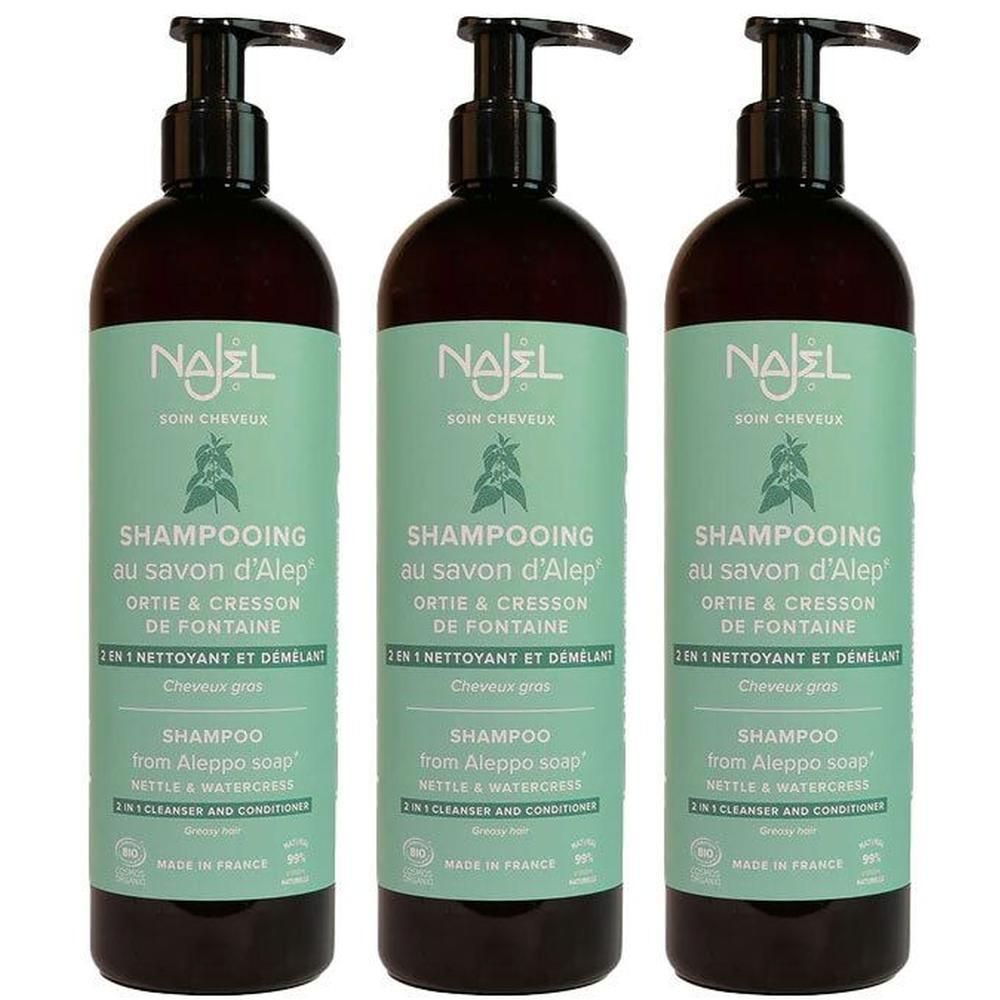 Trois bouteilles de shampoing Najel avec distributeurs à pompe. Étiquette vert clair avec motif végétal et informations produit.