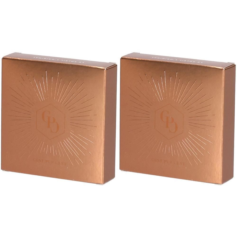 Twee bronzen doosjes met geometrisch patroon en zonsymbool.
