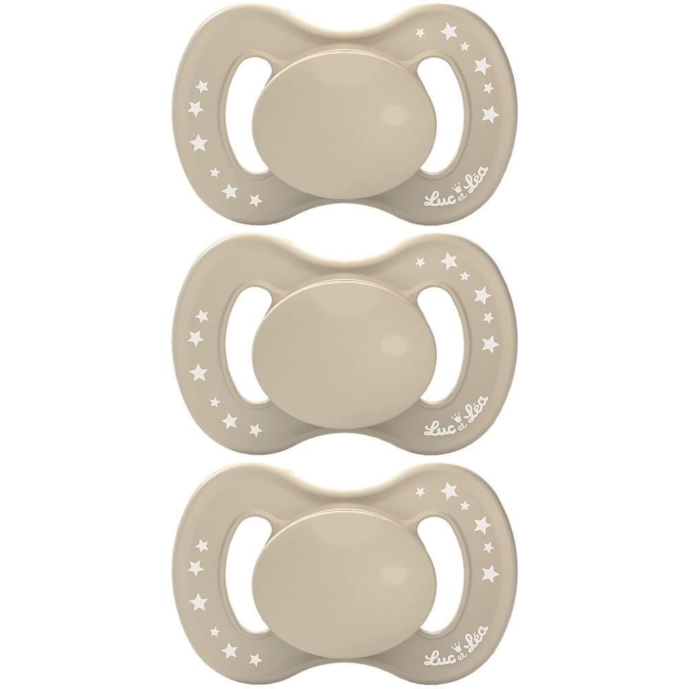 Drie beige fopspenen met sterren en anatomische speen. Merk: Luc et Léa.