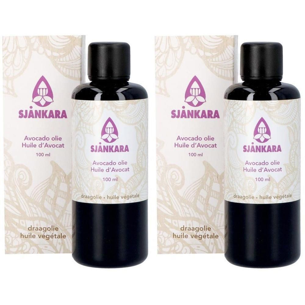 Twee flessen Sjankara Avocado olie, 100ml, met etiketten en zwarte dopjes.