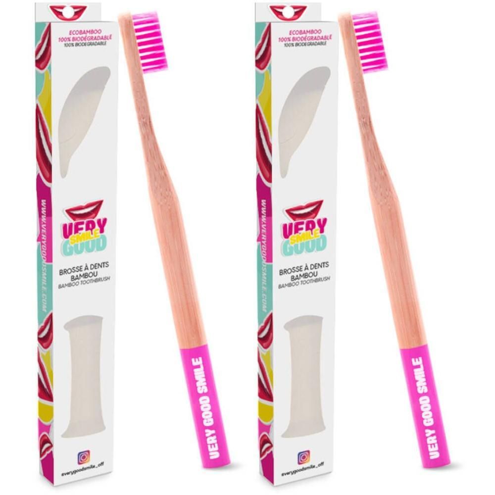 Deux brosses à dents en bambou avec poils et manche roses. Emballage avec logo "VERY GOOD".