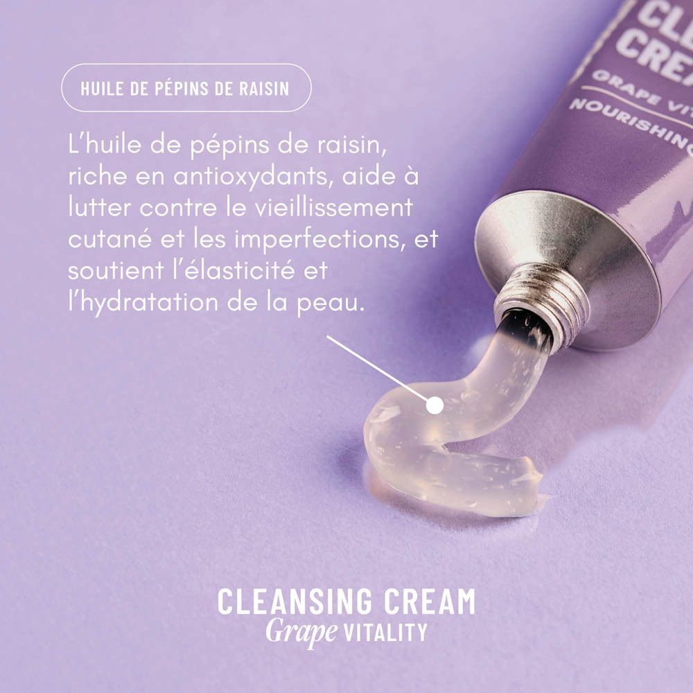 Gros plan d'un tube violet WONDR Cleansing Cream Grape Vitality, avec de la crème qui sort.