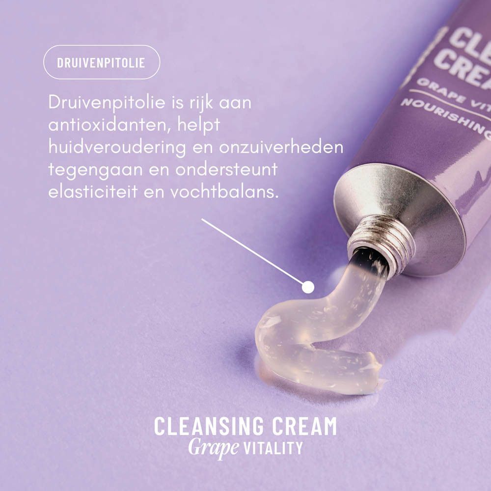 Close-up van een paarse tube WONDR Cleansing Cream Grape Vitality, met crème die eruit komt.