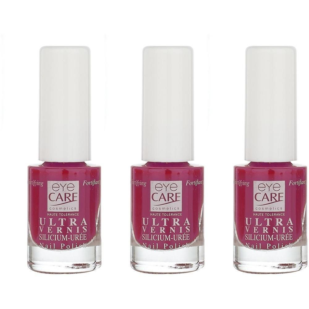 Drie flacons roze nagellak van Eye Care met witte doppen. Het etiket vermeldt 'ULTRA VERNIS SILICIUM-UREE'.