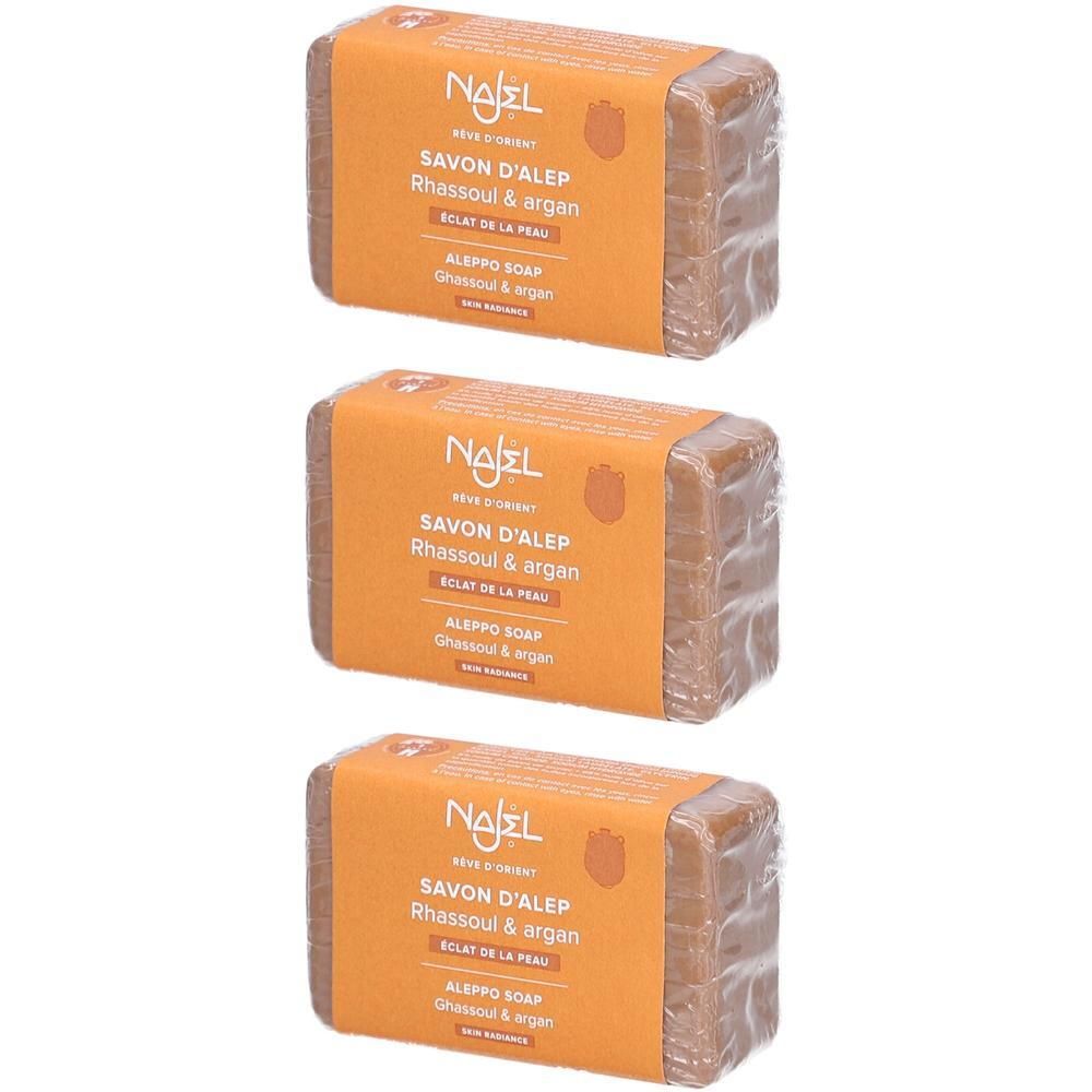 Trois savons d'Alep Najel au Rhassoul & Argan. Emballage orange avec informations produit.