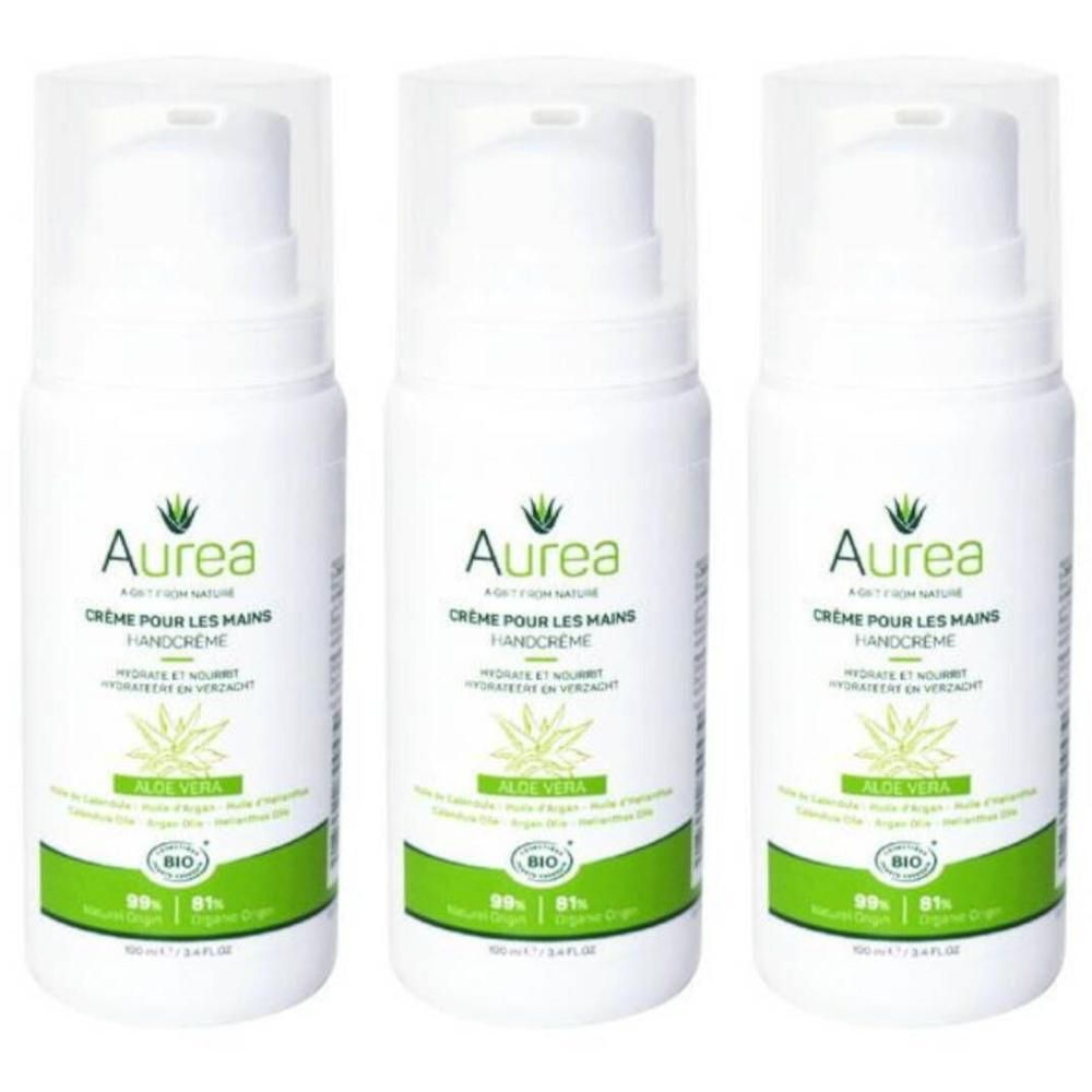 Drie flessen Aurea handcrème met pompdos. Witte flessen met groene en gouden etiketten.