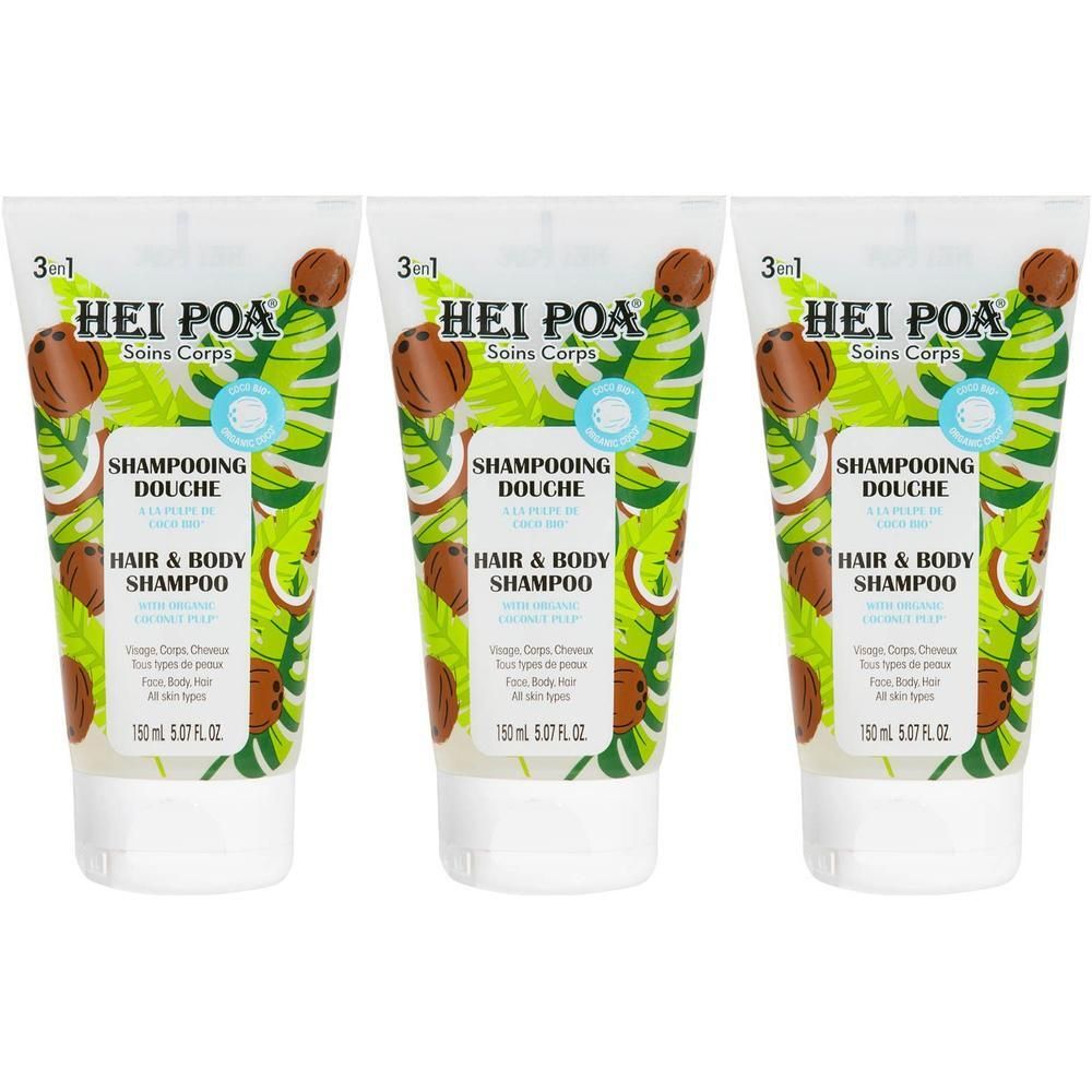 Trois flacons de shampooing douche Hei Poa 3-en-1 à la noix de coco, avec des feuilles tropicales.