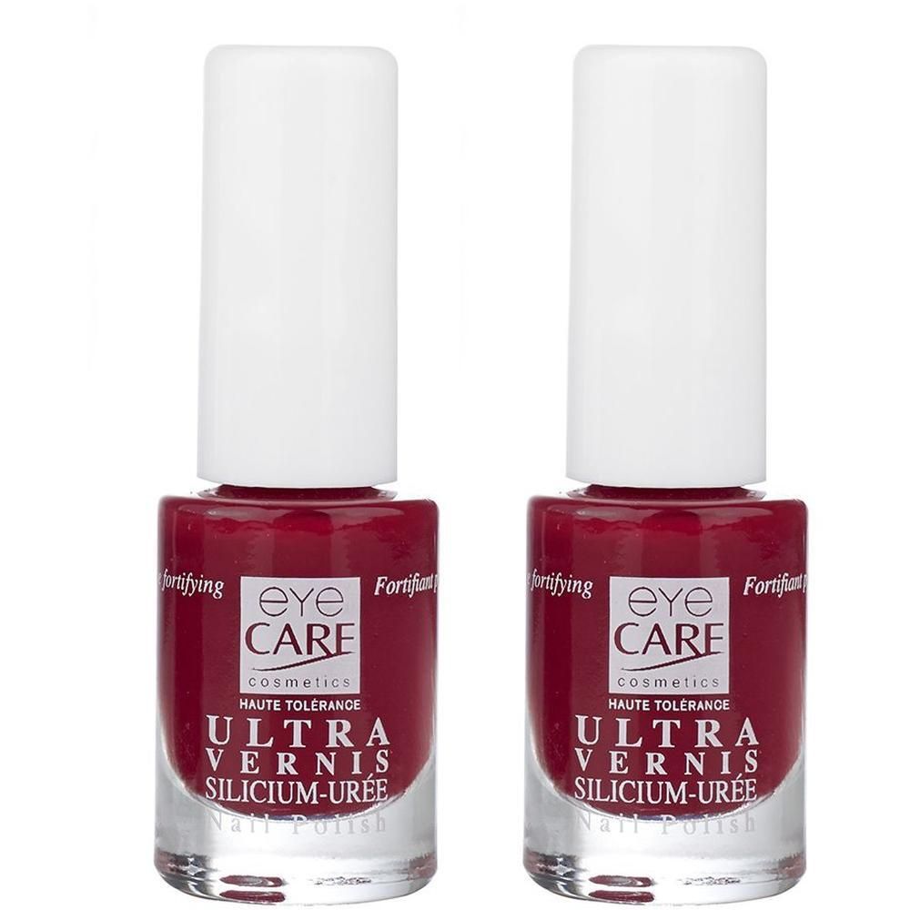 Deux flacons de vernis à ongles rouge Eye Care Cosmetics.