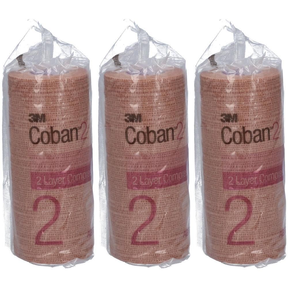Trois rouleaux de bandage compressif 3M Coban 2, 2 couches, couleur chair, emballés dans du plastique.
