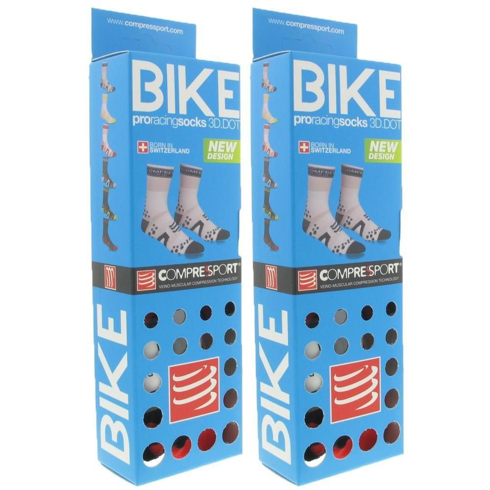 Twee verpakkingen Compressport Bike sokken met "3D DOT" technologie. Blauwe verpakking met productafbeeldingen.