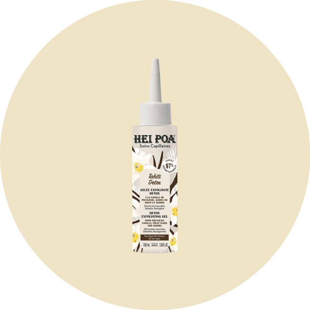 Een flacon Hei Poa Tahiti Detox Gelée Exfoliante Detox op een lichte achtergrond.