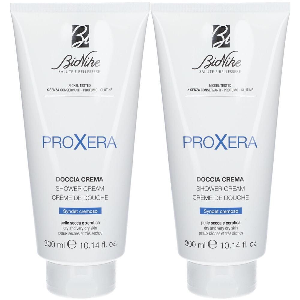 Deux tubes blancs de crème douche BioNike Proxera, 300 ml.
