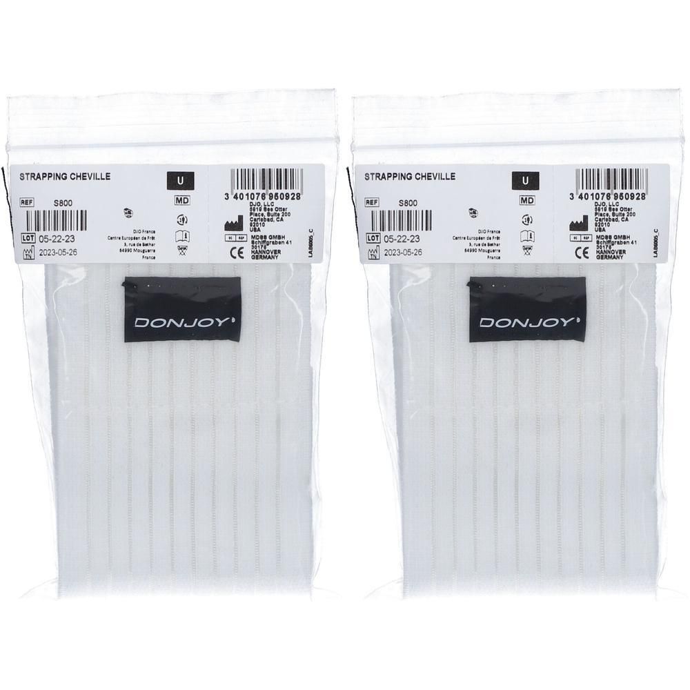 Twee pakken witte enkelbanden van DonJoy.