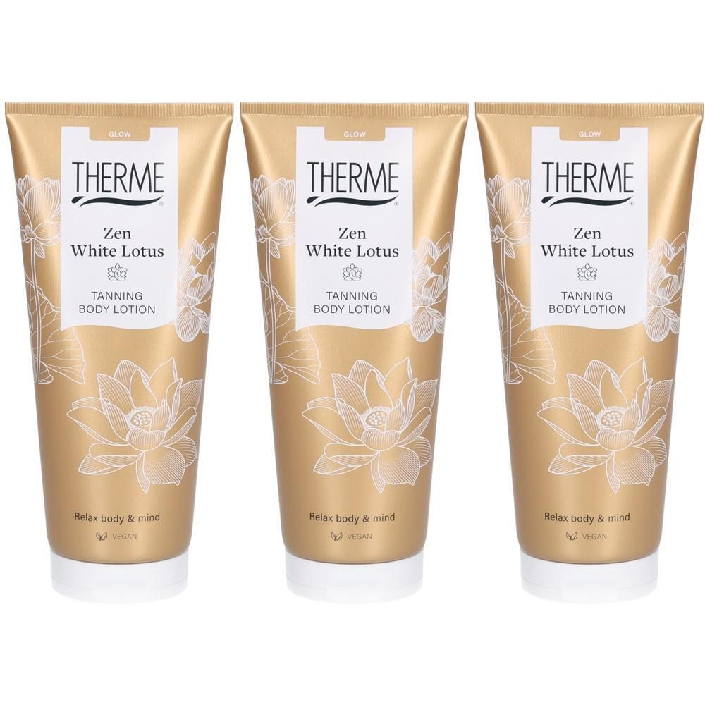 Trois tubes dorés de Lotion Bronzante pour le Corps Therme Zen White Lotus, ornés de motifs de lotus blancs.