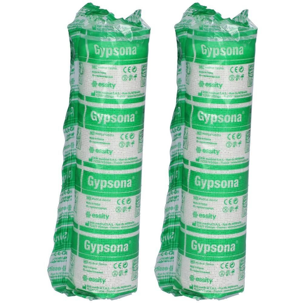 Deux rouleaux de plâtre Gypsona, emballés individuellement dans un film vert avec inscriptions blanches.
