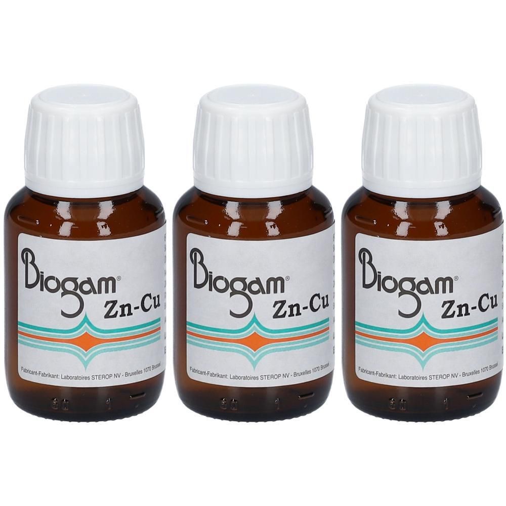 Trois flacons en verre brun avec bouchons à vis blancs, étiquetés "Biogam Zn-Cu".
