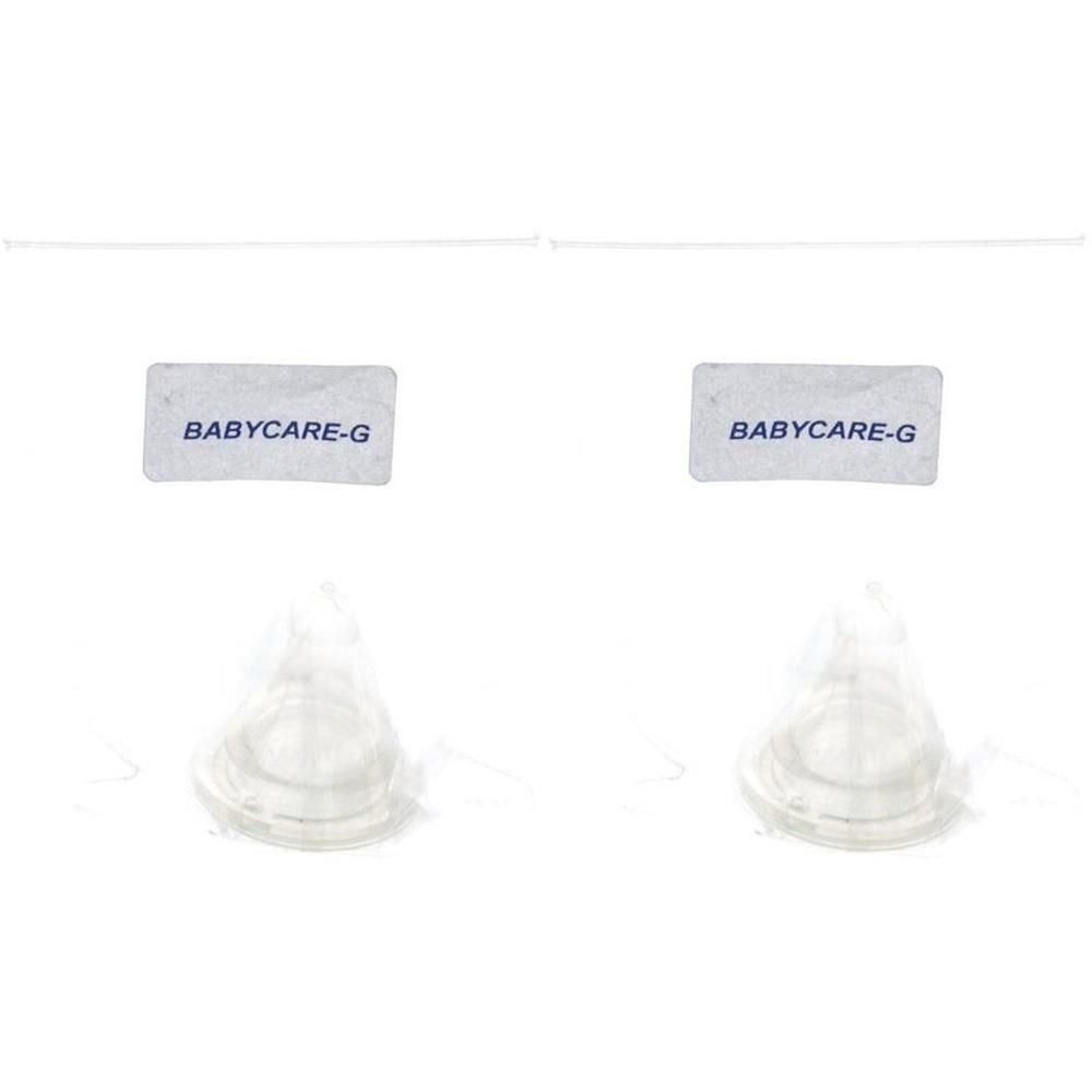 Deux tétines en silicone Babycare-G. Forme conique transparente avec base côtelée.