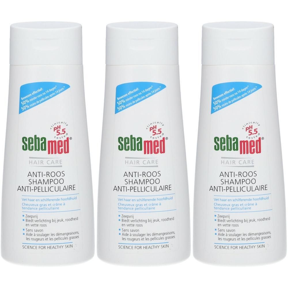 Drie flessen Sebamed Anti-Roos Shampoo. Wit met rode en groene accenten. pH 5.5.