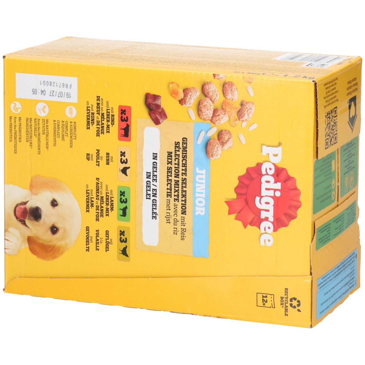 Vue latérale de la boîte Pedigree Junior avec sélection bœuf, poulet, agneau et volaille.