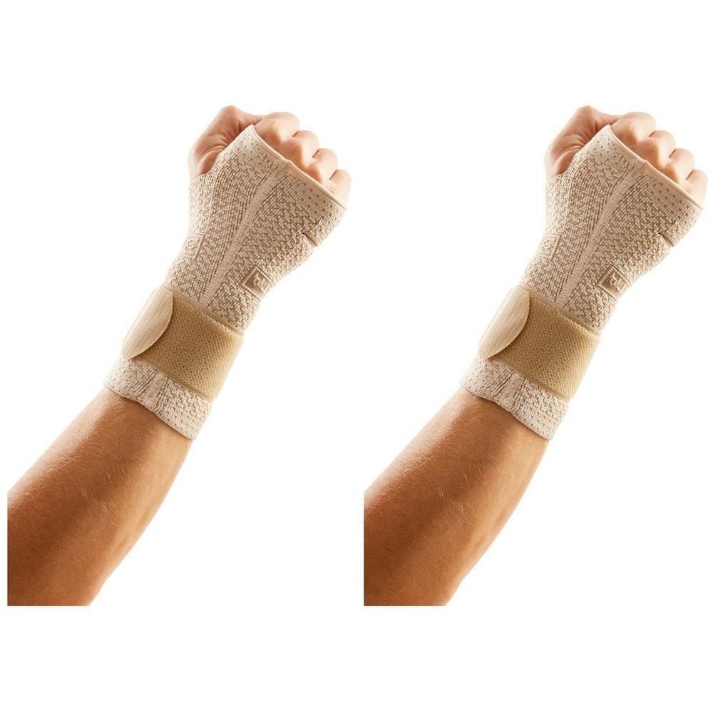 Deux genouillères en tissu beige avec fermeture velcro.