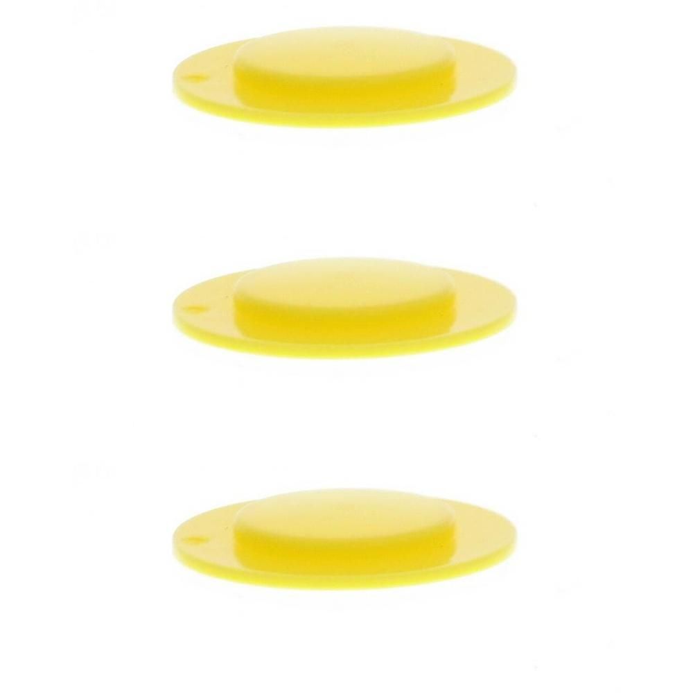 Drie gele inzetstukken met platte basis en verhoogd midden.