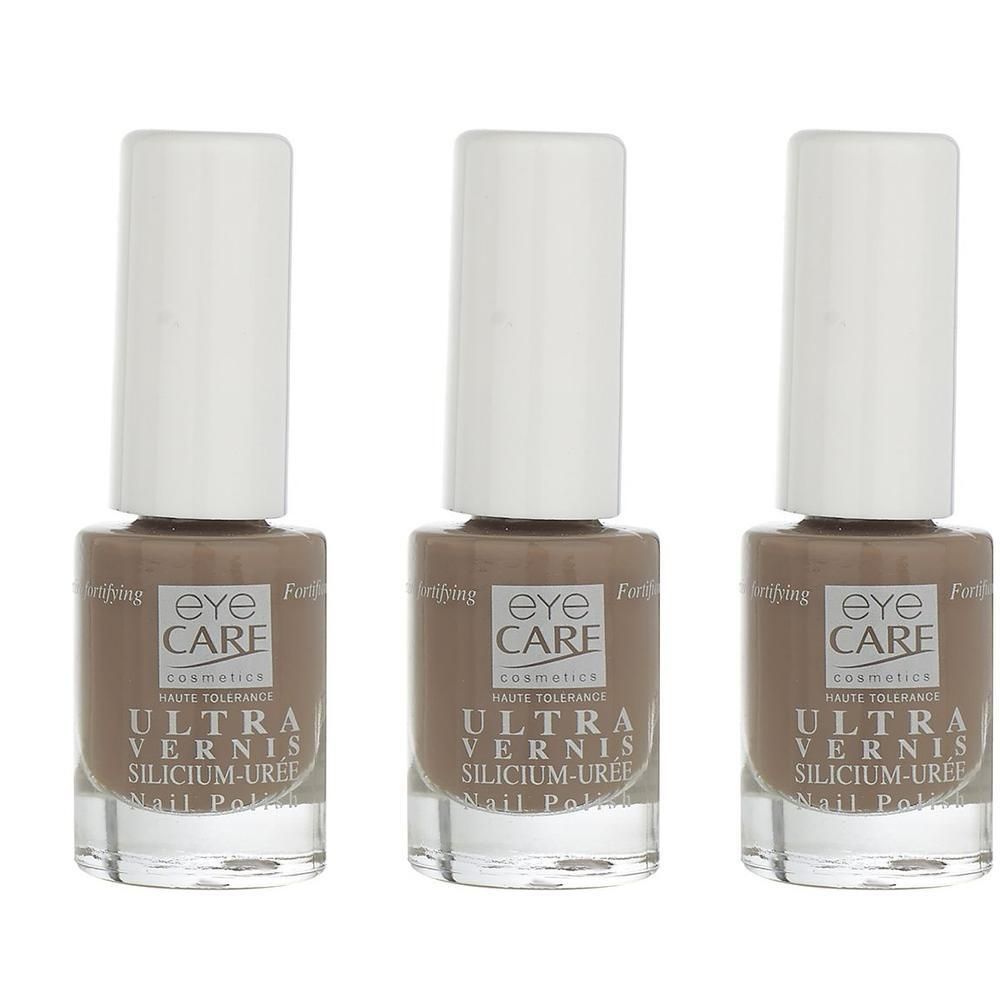 Drie flacons Eye Care Ultra Vernis Silicium-Uree nagellak in bruine kleur.