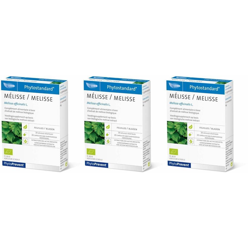 Trois boîtes Phytostandard Mélisse avec feuilles de mélisse.
