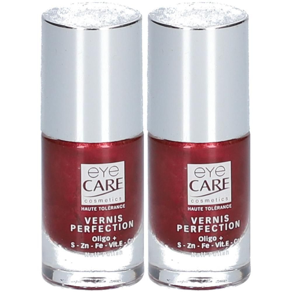 Twee flacons rode nagellak van Eye Care met zilveren doppen. Etiket toont 'Vernis Perfection'.