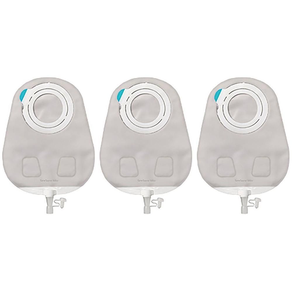 Trois poches d'urostomie grises avec robinet de vidange et bord adhésif.