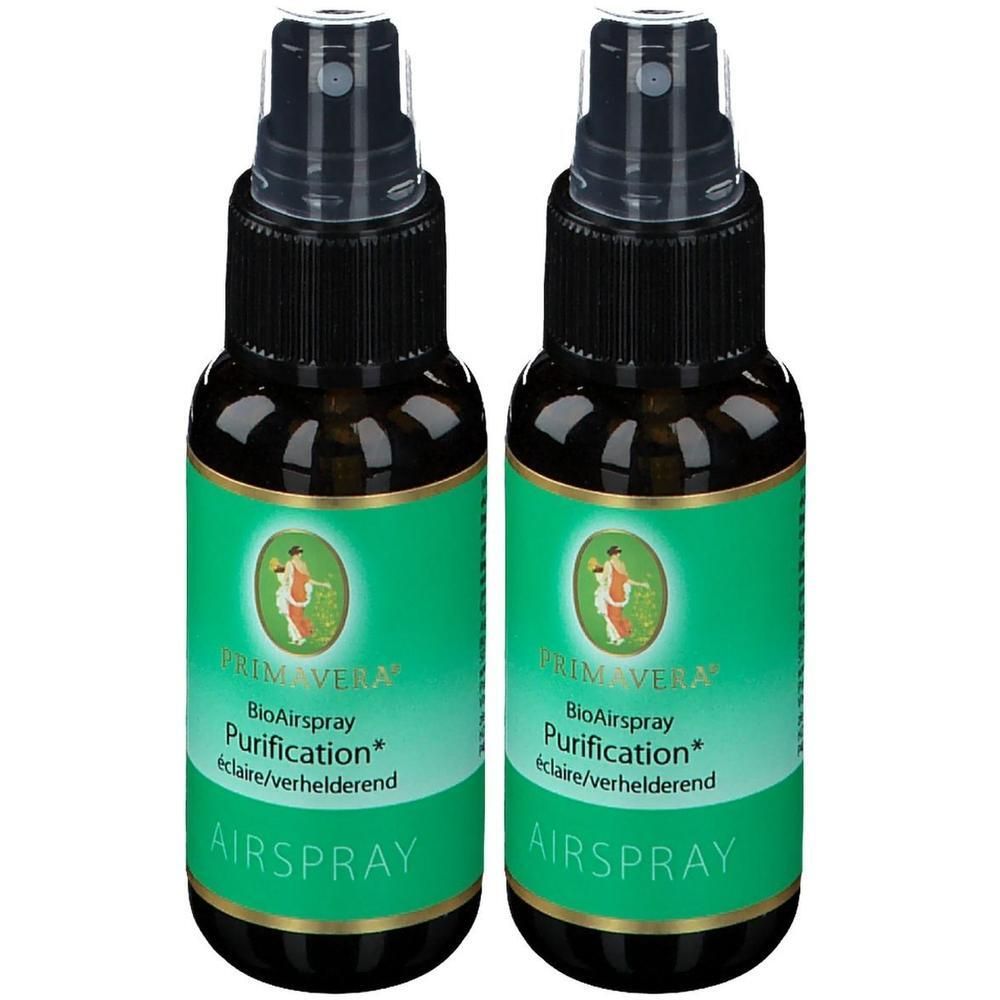Deux flacons pulvérisateurs Primavera BioAirspray Purification avec bouchons noirs et étiquettes vertes.