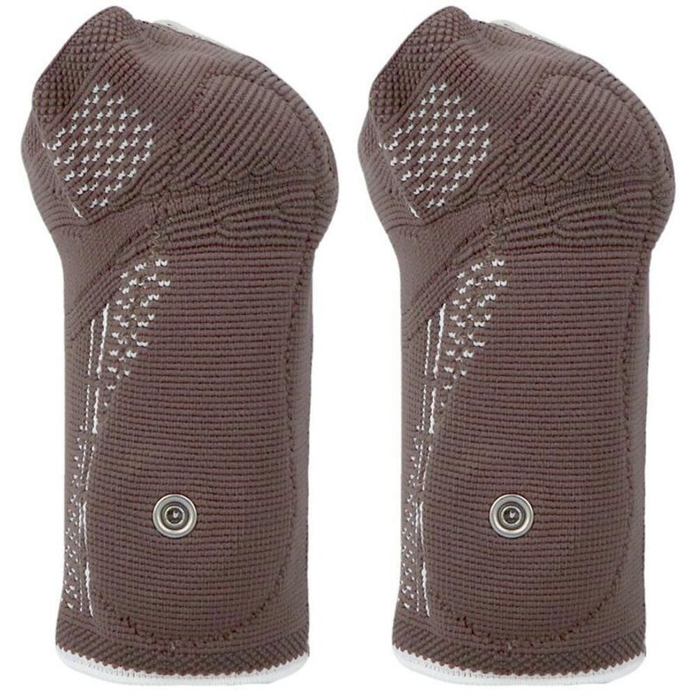 Twee bruine compressie-armbanden met witte accenten en drukknoopjes.