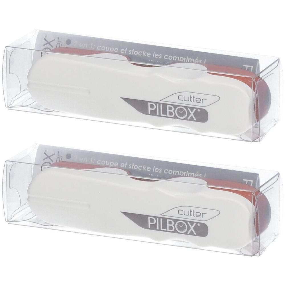 Deux coupe-comprimés Pilbox blancs dans leur emballage transparent.