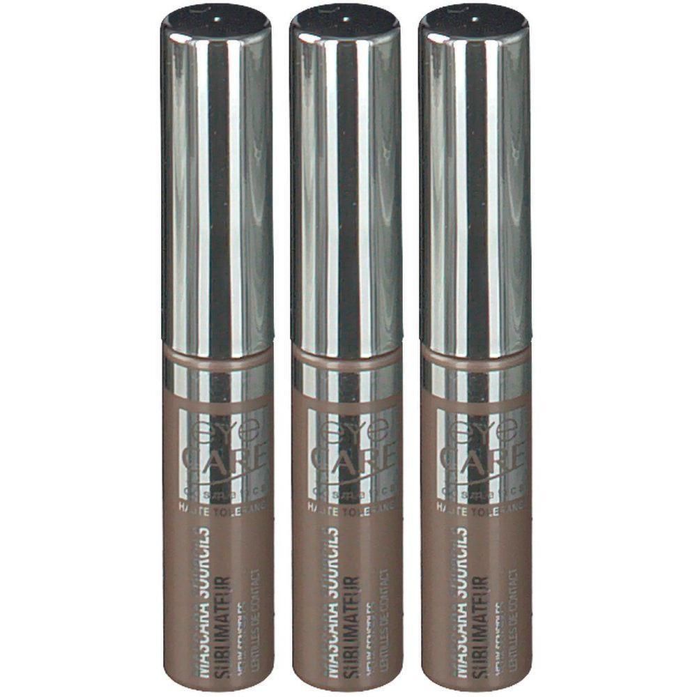 Drie tubes wenkbrauwmascara blond. Zilverkleurige doppen, bruine houders met tekst.