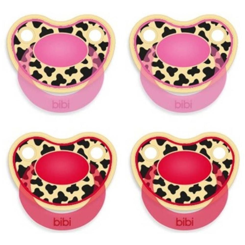 Quatre sucettes Bibi avec motif vache et bouclier rose.