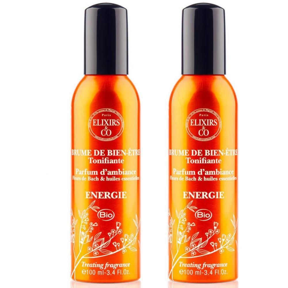 Deux flacons vaporisateurs orange avec bouchon noir. Étiquette : Elixirs & Co, Brume de Bien-Être Tonifiante, Énergie.