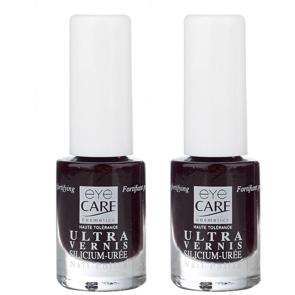Twee flacons Eye Care Ultra Vernis nagellak in donkerrood.