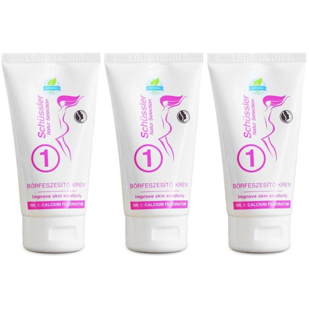 Trois tubes blancs de Crème Schüssler N°1 avec silhouette féminine violette et texte.