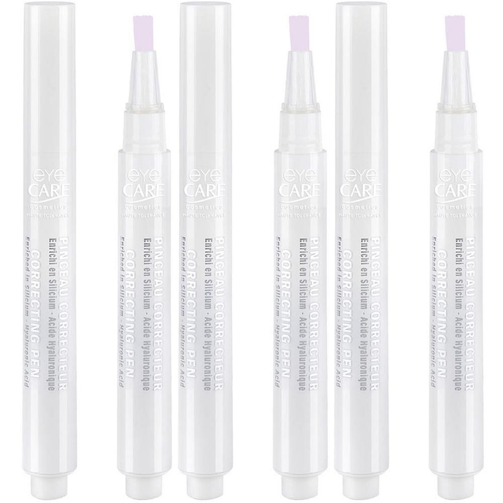 Vier witte corrigerende pennen met applicator en opschrift 'Eye Care Correcting Pen'.