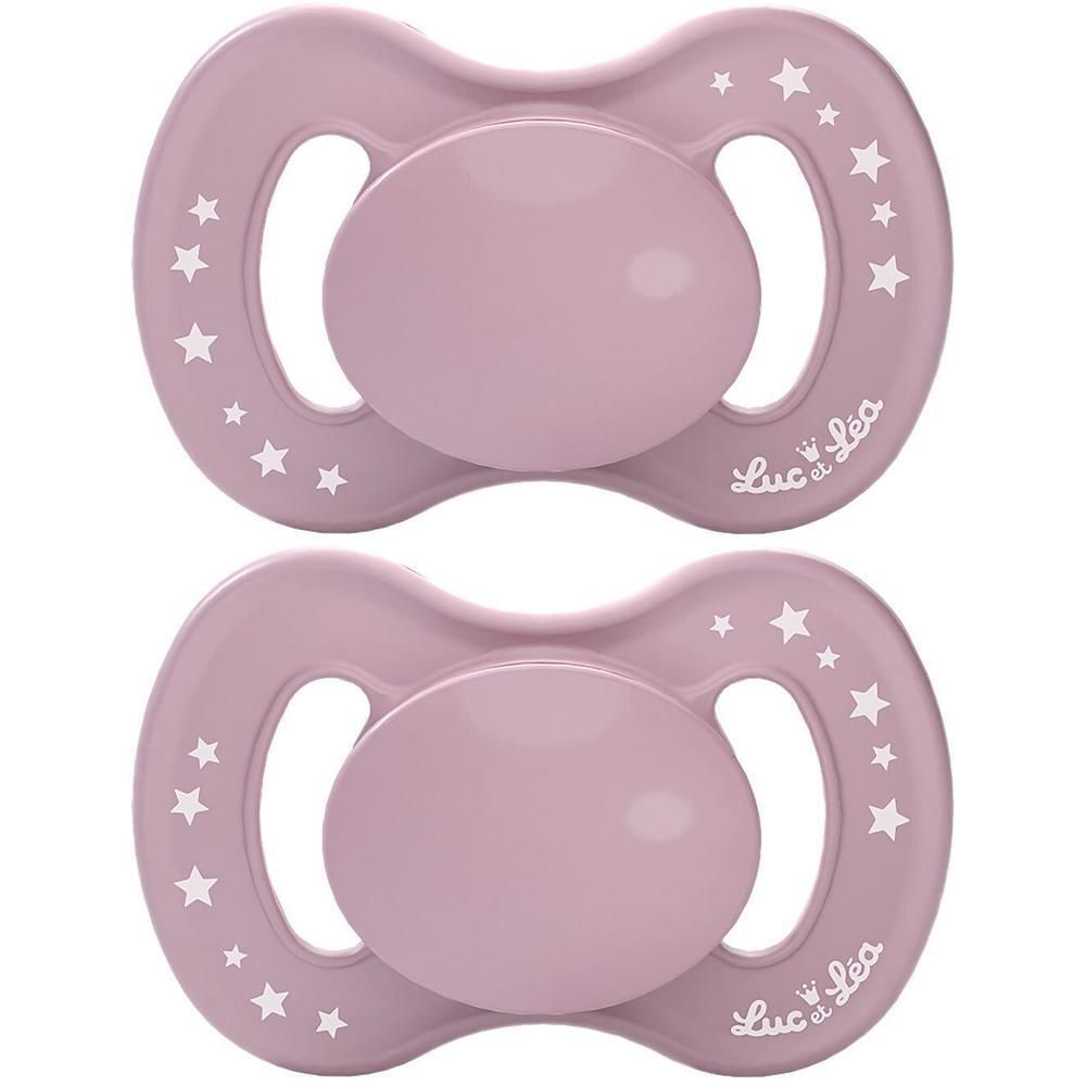 Deux sucettes roses avec des étoiles blanches et le logo 'Luc et Léa'.