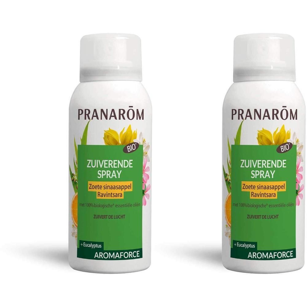 Deux flacons pulvérisateurs blancs avec étiquettes vertes et motifs floraux. Marque: Pranarôm Aromaforce.