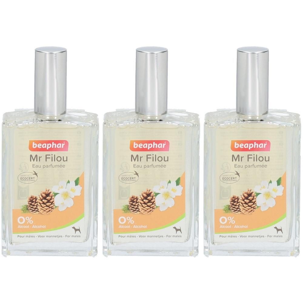Trois flacons Beaphar Mr Filou Eau parfumée pour chiens. Liquide clair dans des bouteilles en verre rectangulaires avec bouchons argentés.