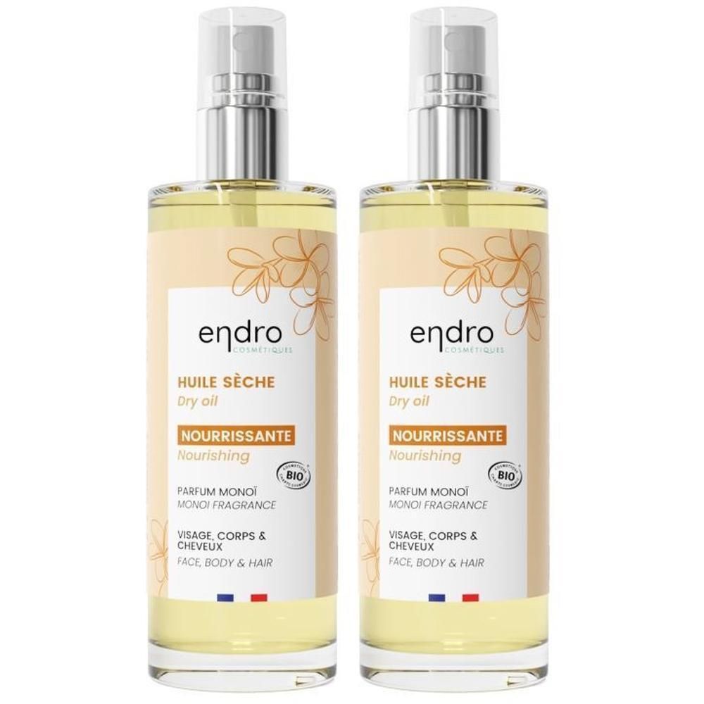 Deux flacons d'Endro Huile Sèche 3-en-1, huile sèche, nourrissante, parfum Monoi, pour visage, corps et cheveux.