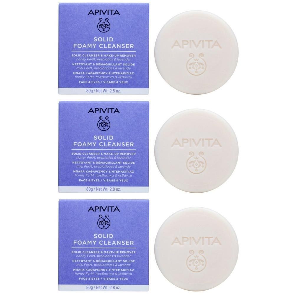 Trois boîtes de Apivita Solid Foamy Cleanser, chacune avec un pain de savon rond.
