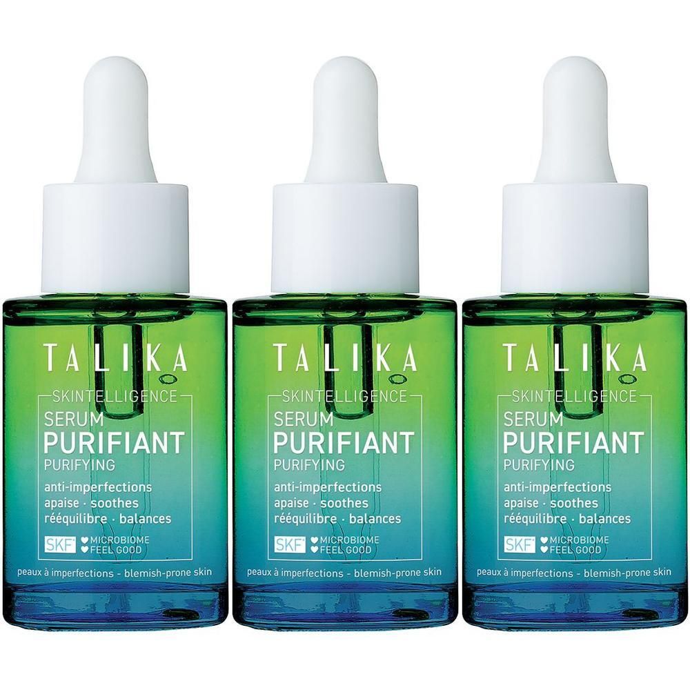 Trois flacons de Talika Skin Intelligence Sérum Purifiant avec compte-gouttes. Dégradés verts et bleus sur les flacons.