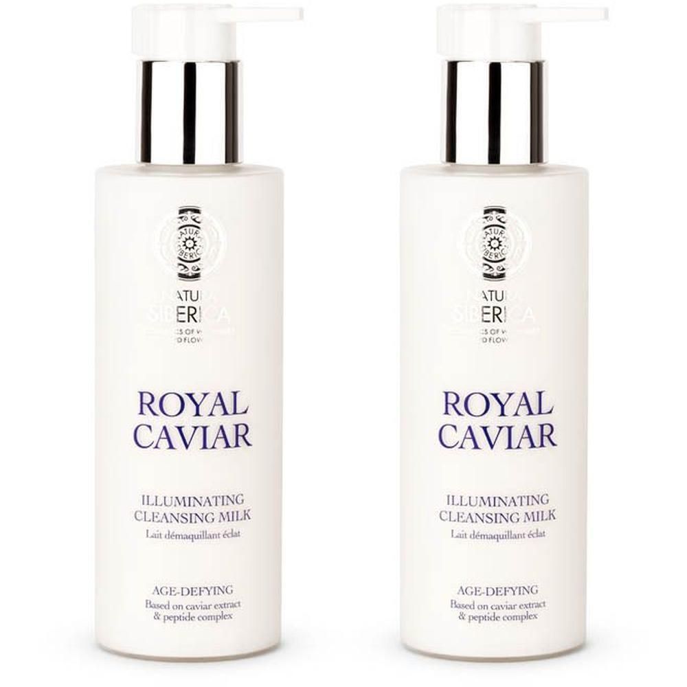 Deux flacons pompe blancs avec inscription 'Royal Caviar Illuminating Cleansing Milk'.